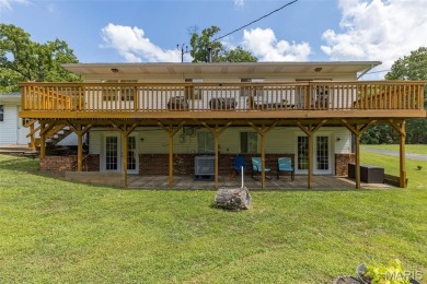 Welcome to your dream home in the sought-after Terre Du Lac on Terre Du Lac Golf and Country Club in Missouri - for sale on GolfHomes.com, golf home, golf lot