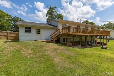Welcome to your dream home in the sought-after Terre Du Lac on Terre Du Lac Golf and Country Club in Missouri - for sale on GolfHomes.com, golf home, golf lot