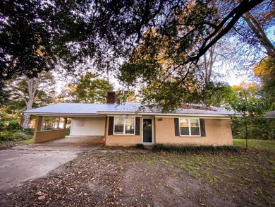 This 2 bedroom, 1 bath camp is located across from Lake Bruin on Lake Bruin Golf and Country Club in Louisiana - for sale on GolfHomes.com, golf home, golf lot