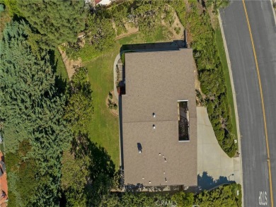 Welcome to this exquisite Mid-Century Modern single-story estate on Knollwood Golf Club in California - for sale on GolfHomes.com, golf home, golf lot