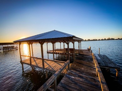 This 2 bedroom, 1 bath camp is located across from Lake Bruin on Lake Bruin Golf and Country Club in Louisiana - for sale on GolfHomes.com, golf home, golf lot