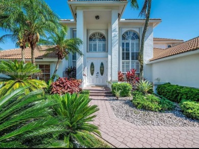 New pics coming soon! Welcome to this luxurious home featuring on Weston Hills Country Club in Florida - for sale on GolfHomes.com, golf home, golf lot