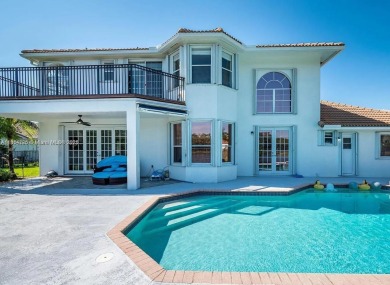 New pics coming soon! Welcome to this luxurious home featuring on Weston Hills Country Club in Florida - for sale on GolfHomes.com, golf home, golf lot