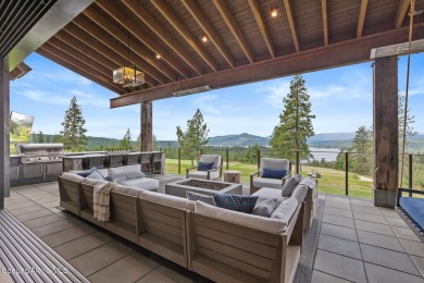 Welcome to this modern lakeview retreat, where thoughtful design on Gozzer Ranch Golf and Lake Club in Idaho - for sale on GolfHomes.com, golf home, golf lot