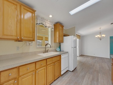 RARE OPPORTUNITY to own this gently used home on TWO LOTS on Barefoot Bay Golf Course in Florida - for sale on GolfHomes.com, golf home, golf lot