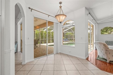 Welcome to your dream home in the gated community of East Lake on East Lake Woodlands Country Club in Florida - for sale on GolfHomes.com, golf home, golf lot
