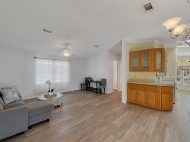 RARE OPPORTUNITY to own this gently used home on TWO LOTS on Barefoot Bay Golf Course in Florida - for sale on GolfHomes.com, golf home, golf lot