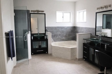 Beautiful 5-bedroom 4 full bath 2 half bath + a private in law on Keys Gate Golf Club in Florida - for sale on GolfHomes.com, golf home, golf lot