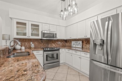 Welcome to your dream home in the gated community of East Lake on East Lake Woodlands Country Club in Florida - for sale on GolfHomes.com, golf home, golf lot