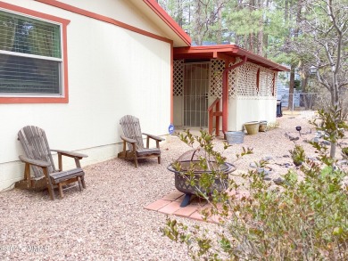 Nestled in the serene Fairway Park community, this delightful on Bison Golf and Country Club in Arizona - for sale on GolfHomes.com, golf home, golf lot