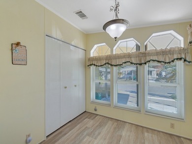 RARE OPPORTUNITY to own this gently used home on TWO LOTS on Barefoot Bay Golf Course in Florida - for sale on GolfHomes.com, golf home, golf lot