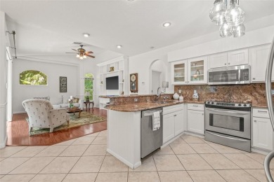 Welcome to your dream home in the gated community of East Lake on East Lake Woodlands Country Club in Florida - for sale on GolfHomes.com, golf home, golf lot