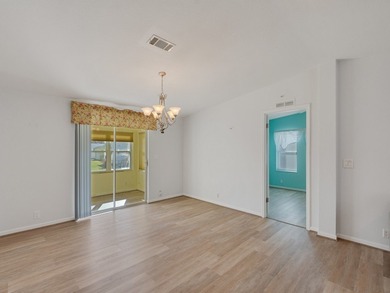 RARE OPPORTUNITY to own this gently used home on TWO LOTS on Barefoot Bay Golf Course in Florida - for sale on GolfHomes.com, golf home, golf lot