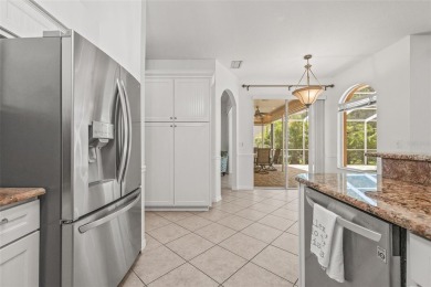 Welcome to your dream home in the gated community of East Lake on East Lake Woodlands Country Club in Florida - for sale on GolfHomes.com, golf home, golf lot