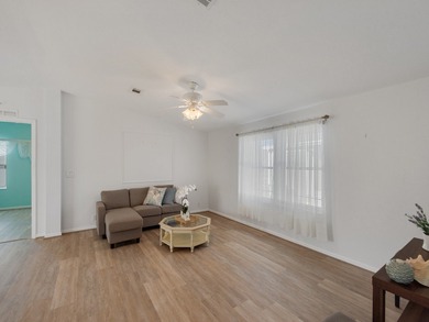 RARE OPPORTUNITY to own this gently used home on TWO LOTS on Barefoot Bay Golf Course in Florida - for sale on GolfHomes.com, golf home, golf lot