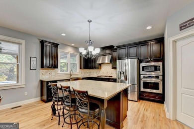 Welcome to this beautifully maintained four-sided BRICK ESTATE on Windermere Golf Club in Georgia - for sale on GolfHomes.com, golf home, golf lot