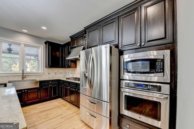 Welcome to this beautifully maintained four-sided BRICK ESTATE on Windermere Golf Club in Georgia - for sale on GolfHomes.com, golf home, golf lot