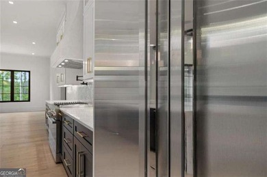 Welcome to a statement home in the prestigious Echelon community on Echelon Golf Club in Georgia - for sale on GolfHomes.com, golf home, golf lot