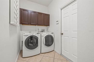 Welcome to your dream home in the gated community of East Lake on East Lake Woodlands Country Club in Florida - for sale on GolfHomes.com, golf home, golf lot