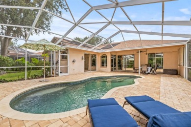 Welcome to your dream home in the gated community of East Lake on East Lake Woodlands Country Club in Florida - for sale on GolfHomes.com, golf home, golf lot