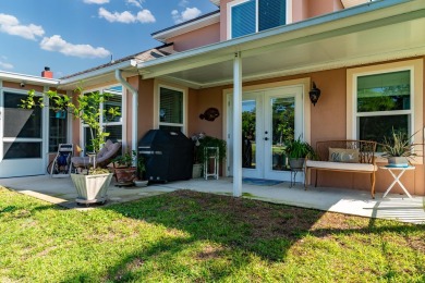 This inviting home, nestled on a small lake along the 3rd on Shalimar Pointe Golf and Country Club in Florida - for sale on GolfHomes.com, golf home, golf lot