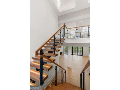 Welcome to a statement home in the prestigious Echelon community on Echelon Golf Club in Georgia - for sale on GolfHomes.com, golf home, golf lot