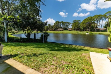 This inviting home, nestled on a small lake along the 3rd on Shalimar Pointe Golf and Country Club in Florida - for sale on GolfHomes.com, golf home, golf lot