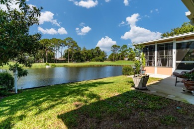 This inviting home, nestled on a small lake along the 3rd on Shalimar Pointe Golf and Country Club in Florida - for sale on GolfHomes.com, golf home, golf lot