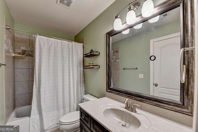 Welcome to this beautifully maintained four-sided BRICK ESTATE on Windermere Golf Club in Georgia - for sale on GolfHomes.com, golf home, golf lot