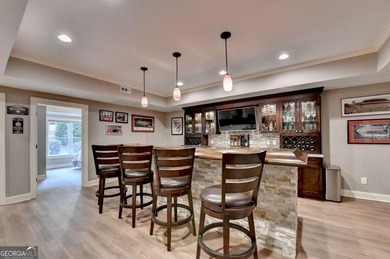 Welcome to this beautifully maintained four-sided BRICK ESTATE on Windermere Golf Club in Georgia - for sale on GolfHomes.com, golf home, golf lot