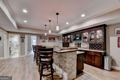 Welcome to this beautifully maintained four-sided BRICK ESTATE on Windermere Golf Club in Georgia - for sale on GolfHomes.com, golf home, golf lot