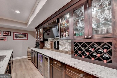 Welcome to this beautifully maintained four-sided BRICK ESTATE on Windermere Golf Club in Georgia - for sale on GolfHomes.com, golf home, golf lot