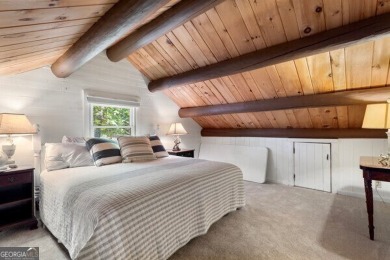 This is a light and bright, fully renovated, real log cabin in on Big Canoe Golf Club - Cherokee in Georgia - for sale on GolfHomes.com, golf home, golf lot