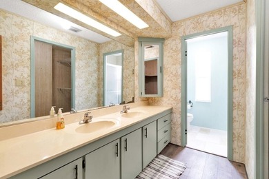 PRICE IMPROVEMENT: FLOWER Section/BAREFOOT BAY - CORNER LOT with on Barefoot Bay Golf Course in Florida - for sale on GolfHomes.com, golf home, golf lot