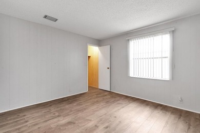 PRICE IMPROVEMENT: FLOWER Section/BAREFOOT BAY - CORNER LOT with on Barefoot Bay Golf Course in Florida - for sale on GolfHomes.com, golf home, golf lot