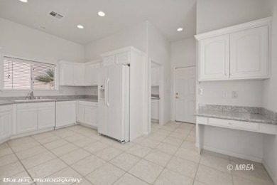 This gorgeous Summer Ridge townhome is tucked away at the end of on The Oasis Golf Club in Nevada - for sale on GolfHomes.com, golf home, golf lot