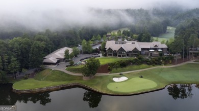 This is a light and bright, fully renovated, real log cabin in on Big Canoe Golf Club - Cherokee in Georgia - for sale on GolfHomes.com, golf home, golf lot