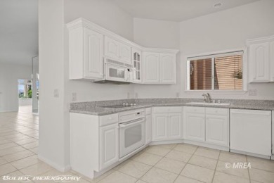 This gorgeous Summer Ridge townhome is tucked away at the end of on The Oasis Golf Club in Nevada - for sale on GolfHomes.com, golf home, golf lot