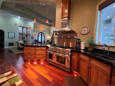 Step into luxury with this tastefully decorated on McAlester Country Club in Oklahoma - for sale on GolfHomes.com, golf home, golf lot