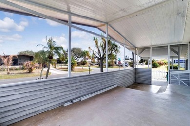 PRICE IMPROVEMENT: FLOWER Section/BAREFOOT BAY - CORNER LOT with on Barefoot Bay Golf Course in Florida - for sale on GolfHomes.com, golf home, golf lot