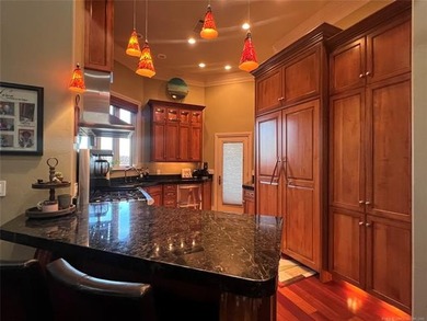 Step into luxury with this tastefully decorated on McAlester Country Club in Oklahoma - for sale on GolfHomes.com, golf home, golf lot