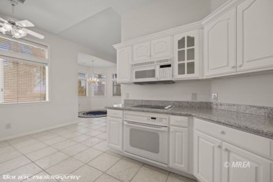 This gorgeous Summer Ridge townhome is tucked away at the end of on The Oasis Golf Club in Nevada - for sale on GolfHomes.com, golf home, golf lot