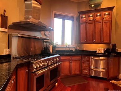 Step into luxury with this tastefully decorated on McAlester Country Club in Oklahoma - for sale on GolfHomes.com, golf home, golf lot