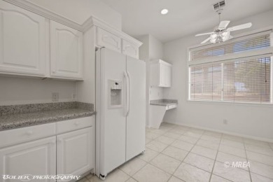 This gorgeous Summer Ridge townhome is tucked away at the end of on The Oasis Golf Club in Nevada - for sale on GolfHomes.com, golf home, golf lot