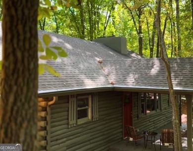 This is a light and bright, fully renovated, real log cabin in on Big Canoe Golf Club - Cherokee in Georgia - for sale on GolfHomes.com, golf home, golf lot