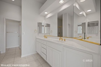 This gorgeous Summer Ridge townhome is tucked away at the end of on The Oasis Golf Club in Nevada - for sale on GolfHomes.com, golf home, golf lot