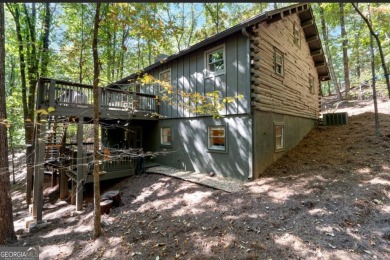 This is a light and bright, fully renovated, real log cabin in on Big Canoe Golf Club - Cherokee in Georgia - for sale on GolfHomes.com, golf home, golf lot