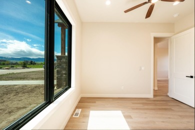 This beautifully crafted 3-bedroom, 2.5-bath home in the Powder on The Powder Horn Golf Club - Mountain in Wyoming - for sale on GolfHomes.com, golf home, golf lot