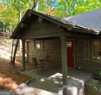 This is a light and bright, fully renovated, real log cabin in on Big Canoe Golf Club - Cherokee in Georgia - for sale on GolfHomes.com, golf home, golf lot