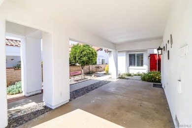 Perched atop a gentle slope, this single-story home offers a on Ocean Hills Country Club in California - for sale on GolfHomes.com, golf home, golf lot